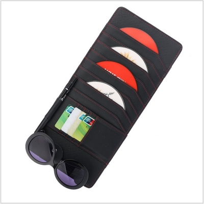 tui kep dia cd tren xe hoi mau den